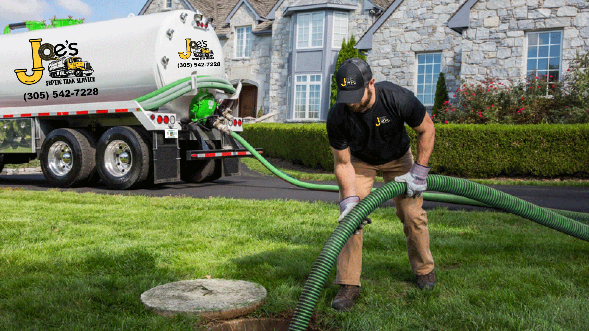 Joe’s branded septic service truck and technician working at a home